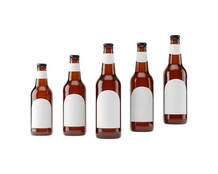 Five brown glass beer bottles with empty blank labels in different sizes standing in a row isolated on white background