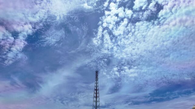 Dramatic Time-lapse with Telecommunication Tower under a Cloudy Blue Sky