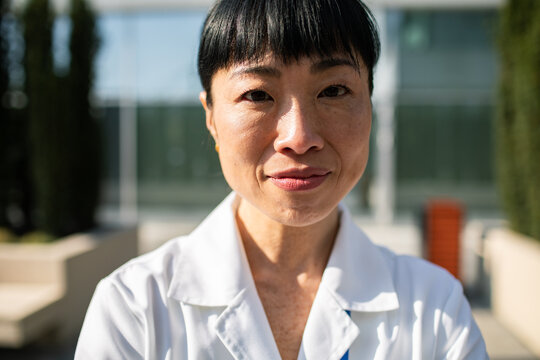 Portrait of healthcare professional outside hospital