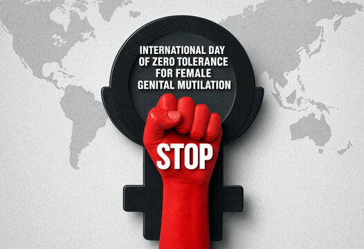 Powerful red fist holding female symbol for international day of zero tolerance against mutilation campaign