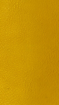 Vibrant Mustard Yellow Leather Texture Surface Background