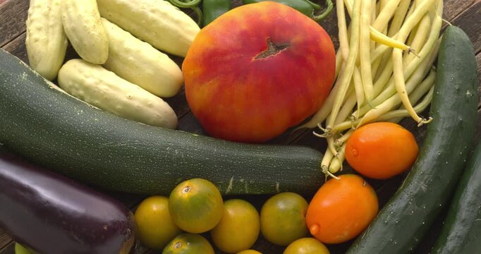 Vegetables from your own garden: tomatoes (Old German, Green Grape Cherry, Yellow Banana), beans, cucumbers (White Wonder and Southern Delight), zucchini, jalape&ntilde;o, aubergine. Table spin.