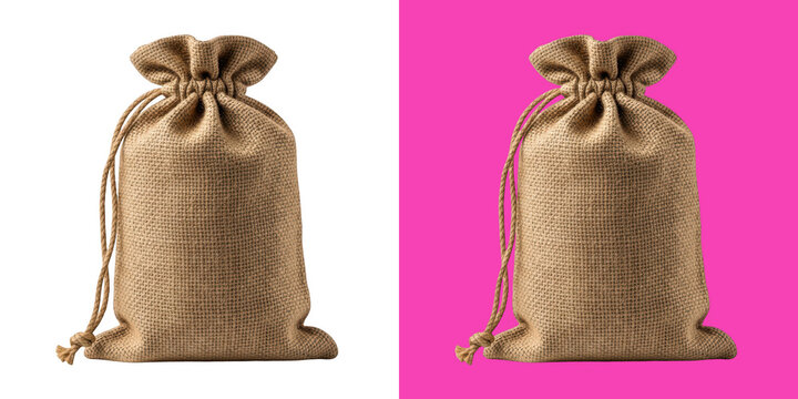 Two empty burlap sacks with drawstrings on pink background