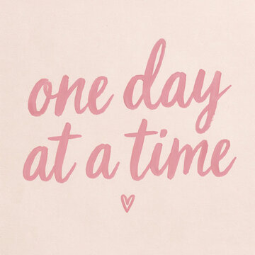 Inspirational brush stroke lettering in vibrant pink displaying the motivational phrase one day at a time accompanied by a delicate heart symbol painted with a textured artistic style