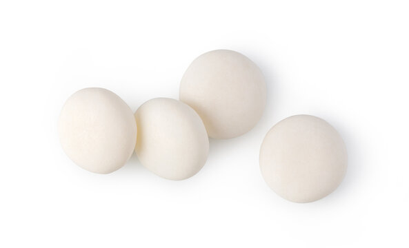 White dragee candy sweets on a white background
