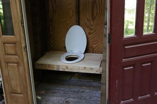 toilet in the bathroom in the woods 