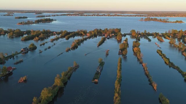 Scenic aerial view of scheendijk loosdrecht lakes during sunset