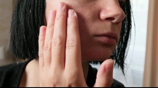 Woman Receiving Professional Facial Skin Care Treatment