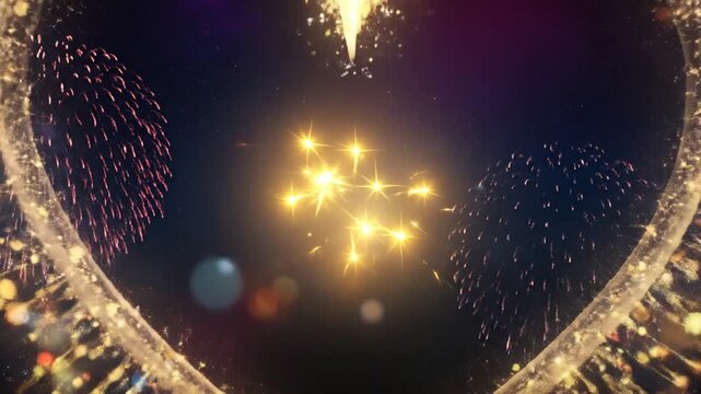 A glowing golden heart shape surrounded by vibrant colorful fireworks