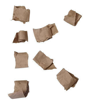 Beige paper cut-out geometric shapes arranged in a scattered pattern