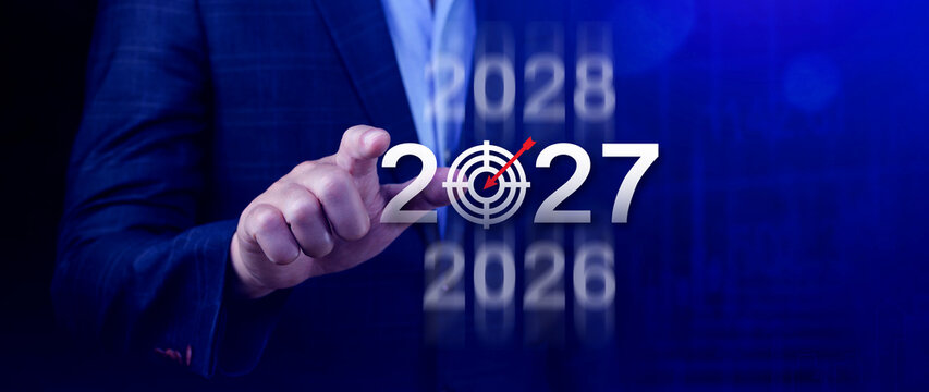 Vision 2027. Business Target for 2027, Businessman Pointing at Year 2027 with Dartboard Target Icon, Financial Goals and Business Strategy, Planning and Investment, not ai
