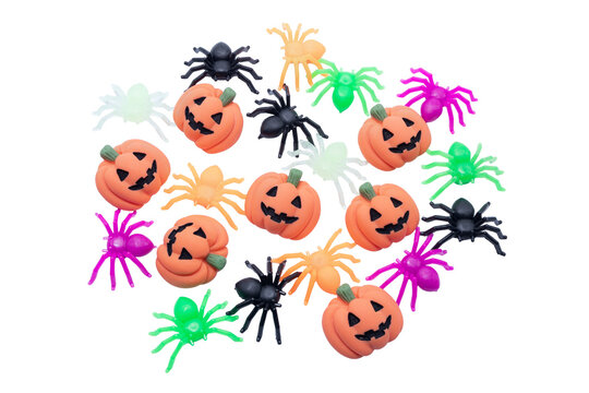 Halloween pumpkins and spiders decorations creating a festive pattern