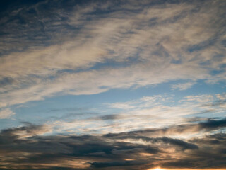 Obraz premium Blue cloudy sky, nature background for design. Clouds have random shape and form.