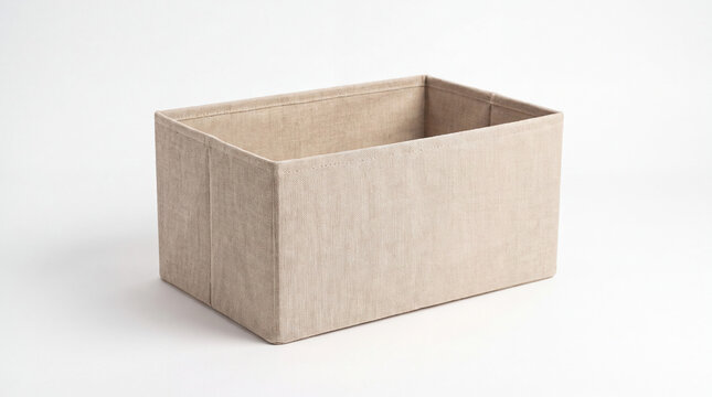 Foldable beige fabric storage bin isolated on white background