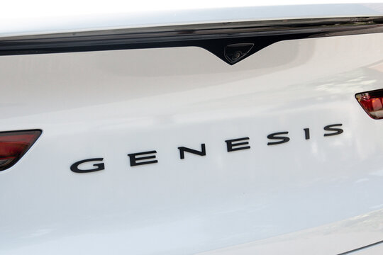Close-up of the iconic Genesis GV80 2026 typo emblem displayed on the back