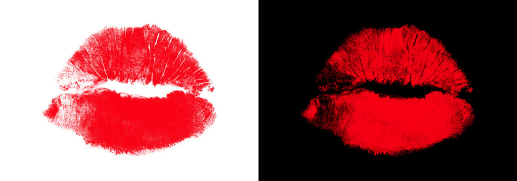 Two vibrant red lip imprints against a black background showcasing a textured and slightly blurred style