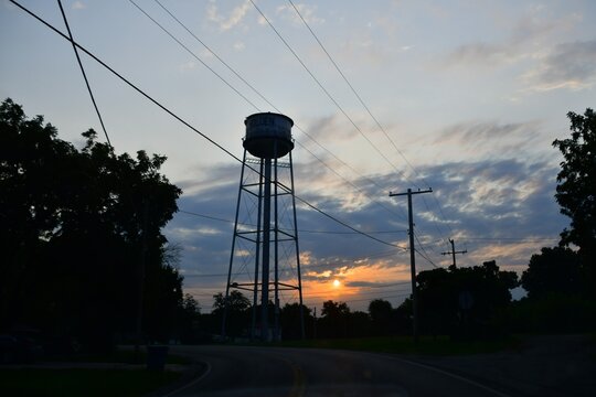 Sunrise Over a Water Tower