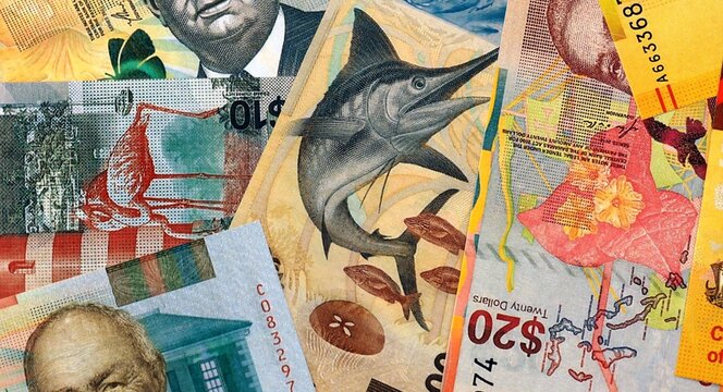 Bahamian dollar money bills in pile on table. Bahamas BSD currency cash close up