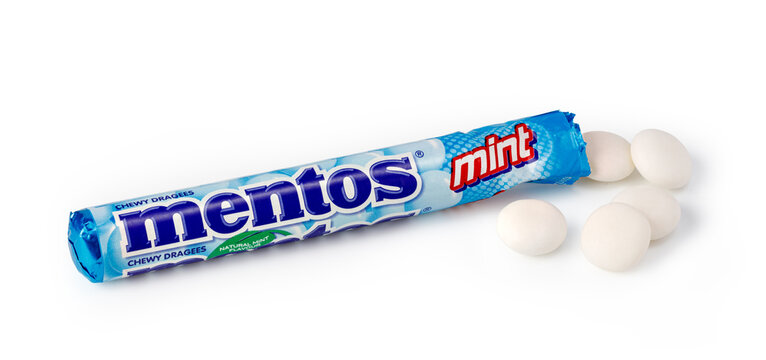 Mentos mint chewy dragees candies refreshing breath on a white background