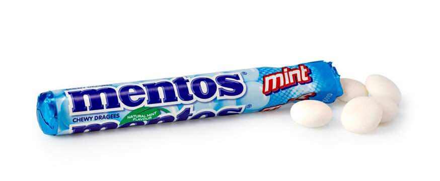 Mentos mint chewy dragees with blue packaging on a white background