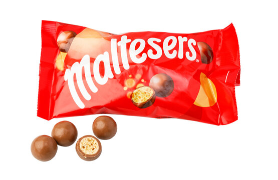 Maltesers candy chocolate malt balls in red package on a transparent background