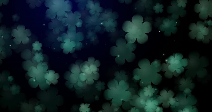Abstract dark background with glowing green clover flower shapes and soft light particles for spring design