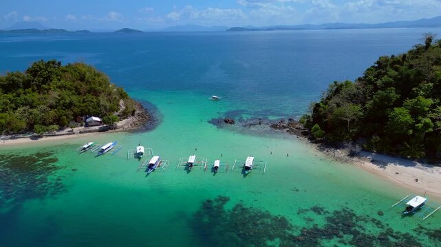 Palawan island hopping with traditional bangka boats. Fantastic aerial view drone