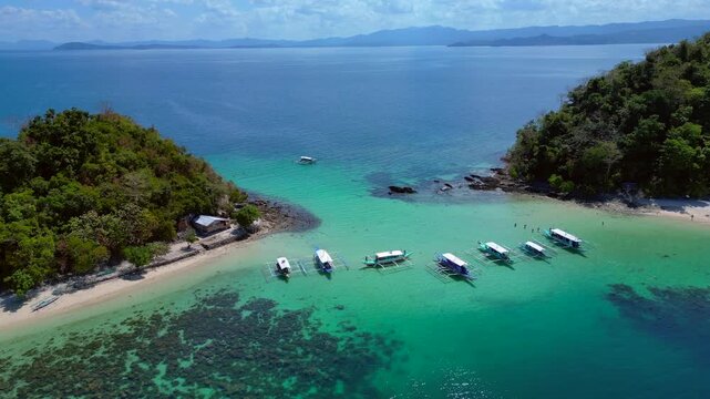 Palawan island hopping with traditional bangka boats. Gorgeous aerial view drone