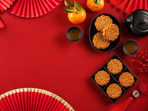 Mid-Autumn Festival Mooncake Flat Lay with Red Copy Space
