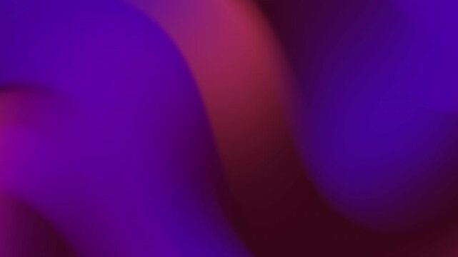 Purple and magenta fluid waves moving in a slow rhythmic motion