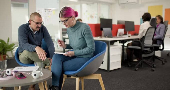 Business team meeting shares ideas and plans in modern office with professionals discussing next steps for their project during work hours