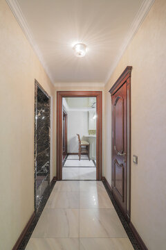 Classic corridor interior with wooden door