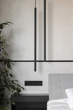 Bedroom interior with tube pendants