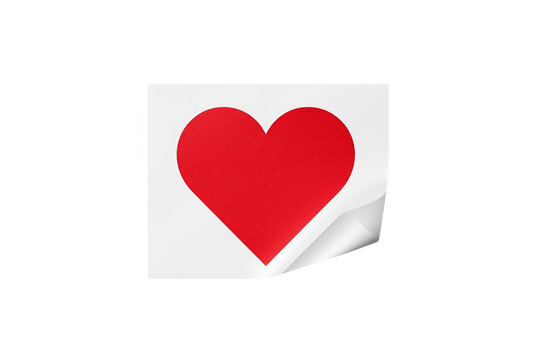 White paper note with large red heart and curled corner