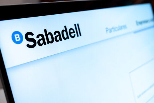 Mexico city, mexico, 02 23 2026: banco sabadell logo on laptop screen showing finance website