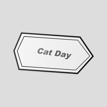 White hexagonal sign with black border and cat day text