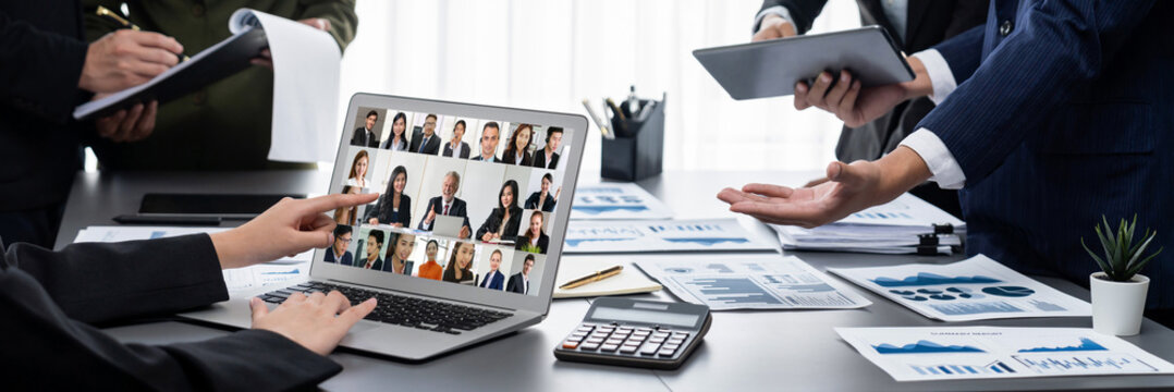Business people on video conference for brisk virtual group meeting of corprate business office workers