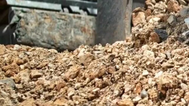 Close-up view of crushed stone and gravel on a construction site