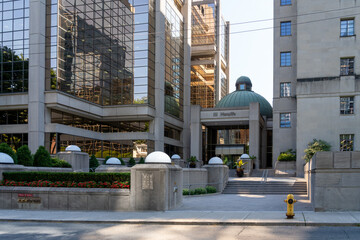 Fototapeta premium Toronto, Ontario, Canada - August 5, 2026: The entrance to Manulife headquarters South Tower on St Paul's Square in Toronto, Ontario, Canada. Manulife is the largest insurance company in Canada. 