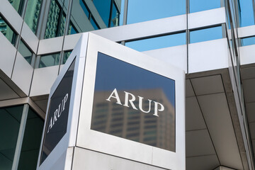 Fototapeta premiumToronto, Ontario, Canada - August 5, 2026: A closeup sign of Arup at their office on Bloor Street E in downtown Toronto, Canada. Arup Group Limited is a British multinational professional services f