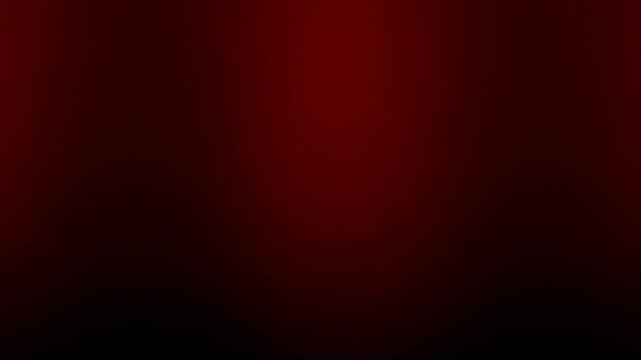 Abstract dark red heat gradient background with soft glowing light spot and dark vignette borders