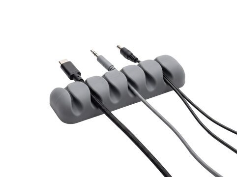 Grey silicone cable organizer with multiple charging cords