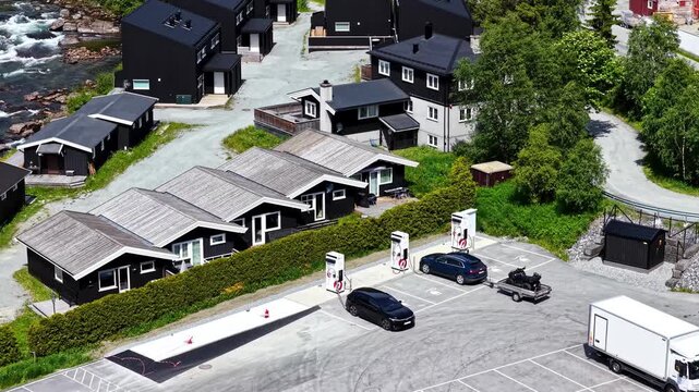 A Quiet Roadside Stop With Cabins and Charging Stations Along the Route From Fl&aring;m to Oslo, Norway - High Angle Shot
