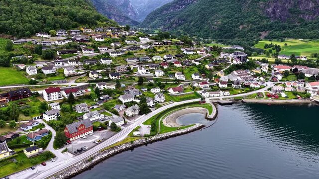 Village Of Aurland Set Against The Steep Mountains Along Aurlandsfjord In Vestland, Norway. Aerial Shot