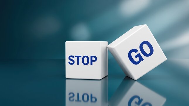 White cubes with stop and go text on blue background, business decision making concept, choice between halt or proceed, traffic light metaphor for management strategy