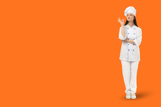 Woman in chef outfit stands with gesture in a colorful space