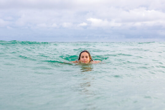 Girl above water in ocean