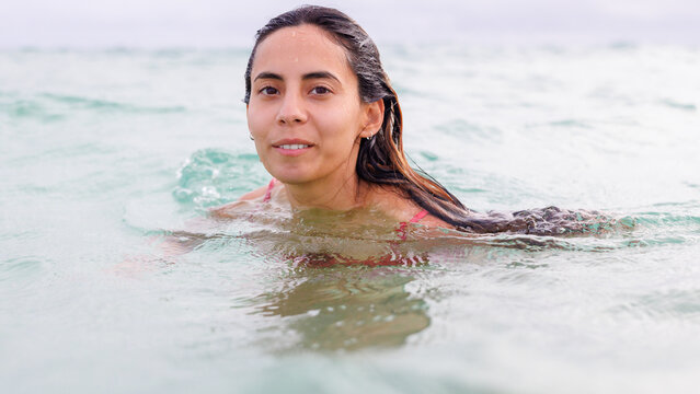 Portrait of woman swimming