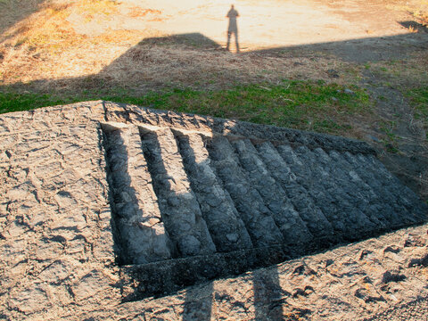 Ancient Stone Steps with Human Shadow