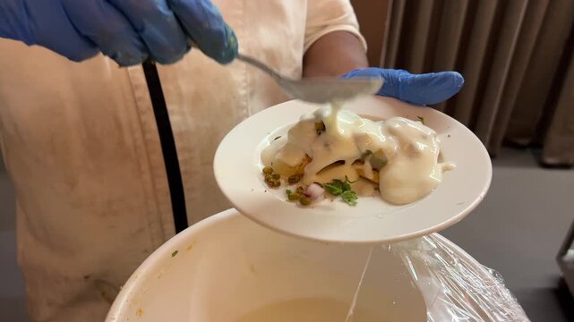 A mouth-watering close-up shot of crisp Dahi Papdi Chaat layered with chilled spiced yogurt, sweet tamarind chutney, and fresh mint, served live at a grand wedding reception in India